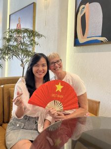 Susan and Kim with Vietnam fan.